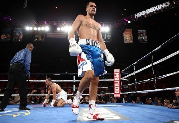 Kovalev Walks Away After Knockdown