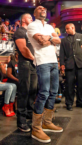 Floyd Mayweather watches the action at ringside.