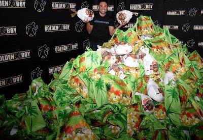 Oscar stands on huge pile for turkey giveaway