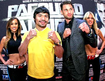 Left to -Right, flanked by the Top Rank Knockouts, Superstar Manny Pacquiao and New York's undefeated (20-0) WBO Jr. Welterweight champion Chris Algieri (R) make their 'Grand Arrival' at The Venetian Las Vegas on 'Day Six' of their worldwide media tour