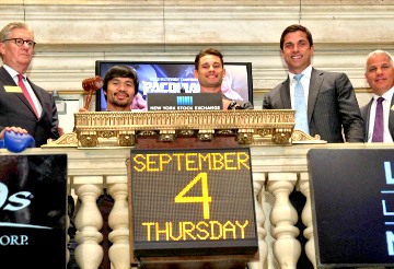 (L-R) Superstar Manny Pacquiao and New York's undefeated (20-0) WBO Jr. Welterweight champion Chris Algieri ring the closing bell with Thomas W. Farley,(2nd R) President, New York Stock Exchange, Ed Tracy,(L) President and CEO of Sands China and Joe DeGuardia, (R) Star Boxing at the New York Stock Exchange Thursday in New York on 'Day 11' of their worldwide tour