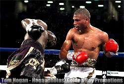 Junior welterweight contender Thomas Dulorme (Right) throws a right hand en route to a split decision victory over Hank Lundy (Left) 