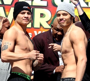 Former WBC Middleweight champion Julio Cesar Chavez Jr. (pictured right), and No. 1 contender Bryan Vera (left) weigh in (both fighters 167.5 lbs) 