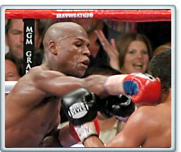 Floyd Mayweather punching Juan Manuel Marquez