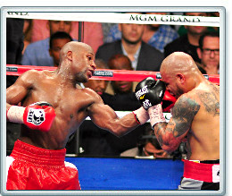 Floyd Mayweather lands punch on Miguel Cotto