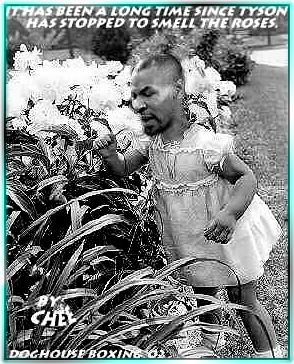 Mike Tyson sniffs flowers